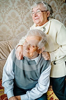 Elderly senior romantic love couple. Old retired man woman together. Aged husband wife in cozy home sweater.Elder