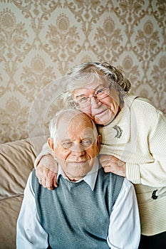 Elderly senior romantic love couple. Old retired man woman together. Aged husband wife in cozy home sweater.Elder