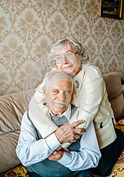 Elderly senior romantic love couple. Old retired man woman together. Aged husband wife in cozy home sweater.Elder