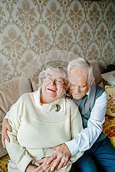 Elderly senior romantic love couple. Old retired man woman together. Aged husband wife in cozy home sweater.Elder