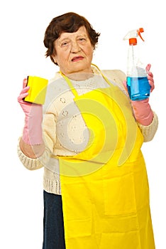 Elderly showing cleaning products