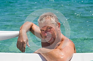 Elderly swimmer in the pool