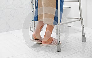 Elderly swollen feet or edema leg walk into bathroom