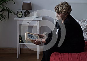 Elderly widowed lady in grief