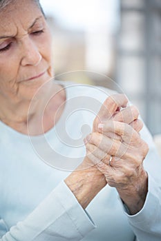 Elderly woman with arthritis. photo