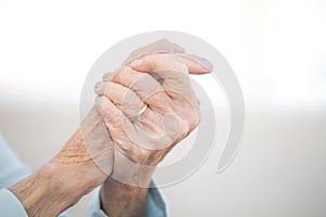 Elderly woman with arthritis. photo
