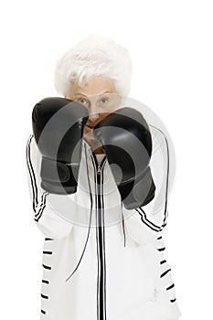 Elderly woman with boxing gloves