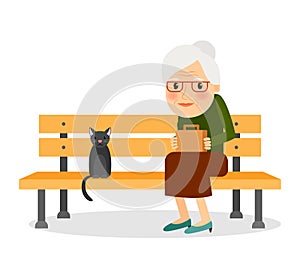 Elderly woman and cat sitting on park bench