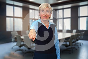 Elderly Woman in the Conference Room