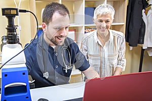 Elderly woman with a doctor, getting some health advice