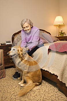 Elderly woman with dog.