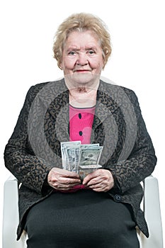 Elderly woman with dollars