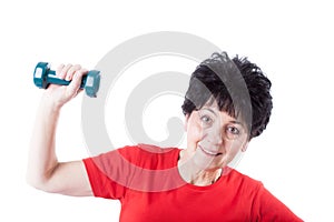 Elderly woman with a dumb-bell