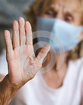 Elderly woman with a face mask