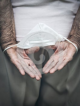 Elderly woman with a face mask