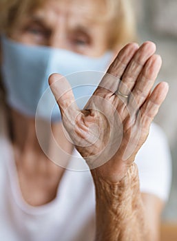 Elderly woman with a face mask