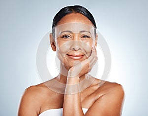 Elderly woman, face and portrait with smile in beauty mockup, skincare for anti aging isolated on studio background