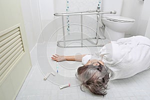 Elderly woman falling in bathroom