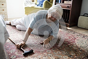 Elderly woman fell on the floor photo