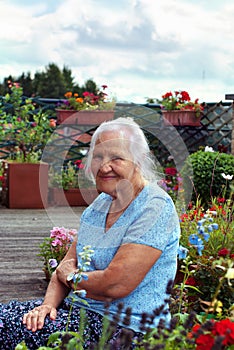 Elderly woman in garden