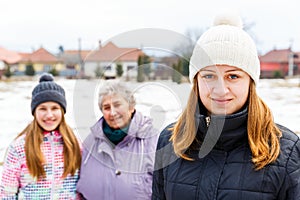 Elderly woman and granddaughters