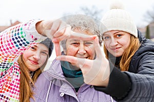 Elderly woman and granddaughters