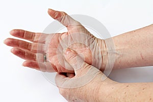 Elderly woman has pain in his hands
