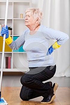 Elderly woman having back pain