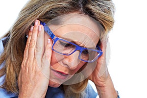 Elderly woman having a headache.