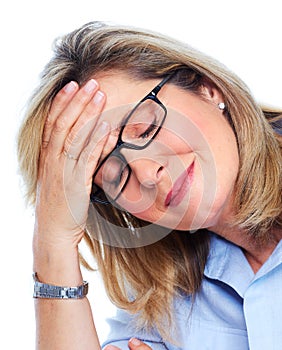 Elderly woman having a headache.