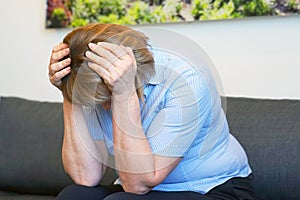 Elderly woman headache. Woman squeezes her hea