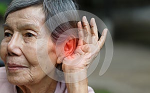 Elderly woman hearing loss , Hard of hearing