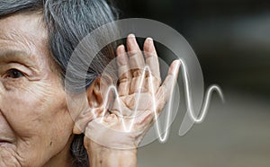 Elderly woman hearing loss , Hard of hearing