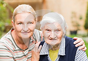 Elderly woman with her daughter