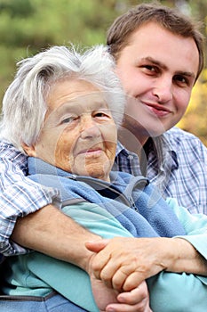 Elderly woman with her grandson