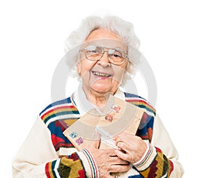 Elderly woman holding old envelops