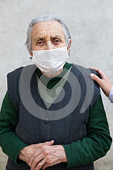 Elderly woman with mask