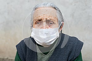 Elderly woman with mask