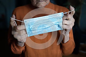 Elderly woman with medical mask for prevent coronavirus infect. photo