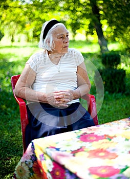Elderly woman outdoors