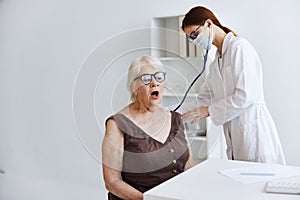 elderly woman patient hospital examination health care