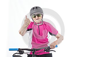 Elderly woman in pink shirt with a bike