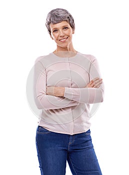 Elderly woman, portrait and arms crossed in studio with smile, happiness and confidence on isolated white background