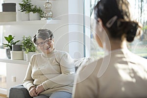 Elderly woman relaxing at sanatorium photo