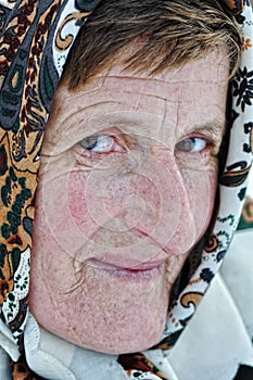 Elderly woman with scarf