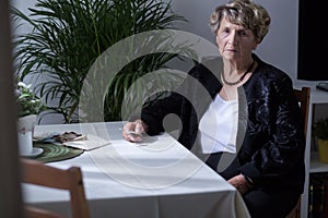 Elderly woman sitting