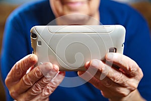 Elderly woman with a smartphone