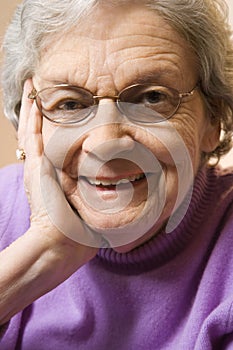 Elderly woman smiling.