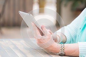 Elderly woman tablet