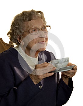 Elderly woman with tea